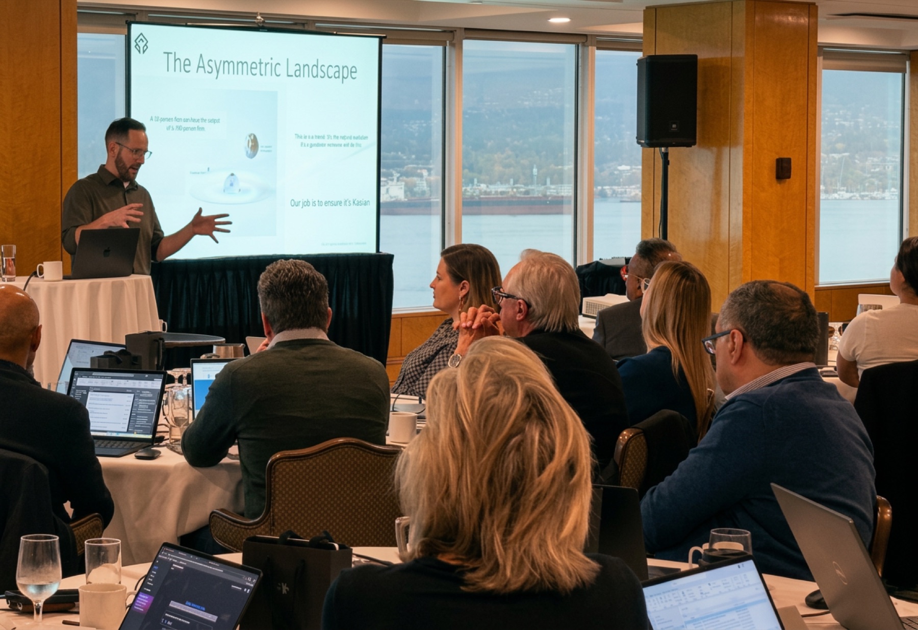 Brayden presenting The Asymmetric Landscape to a firm's leadership team